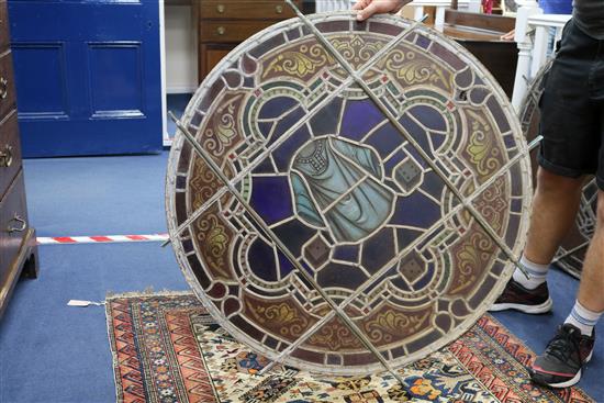 A set of eleven 19th century stained glass roundels, diameter 24in.